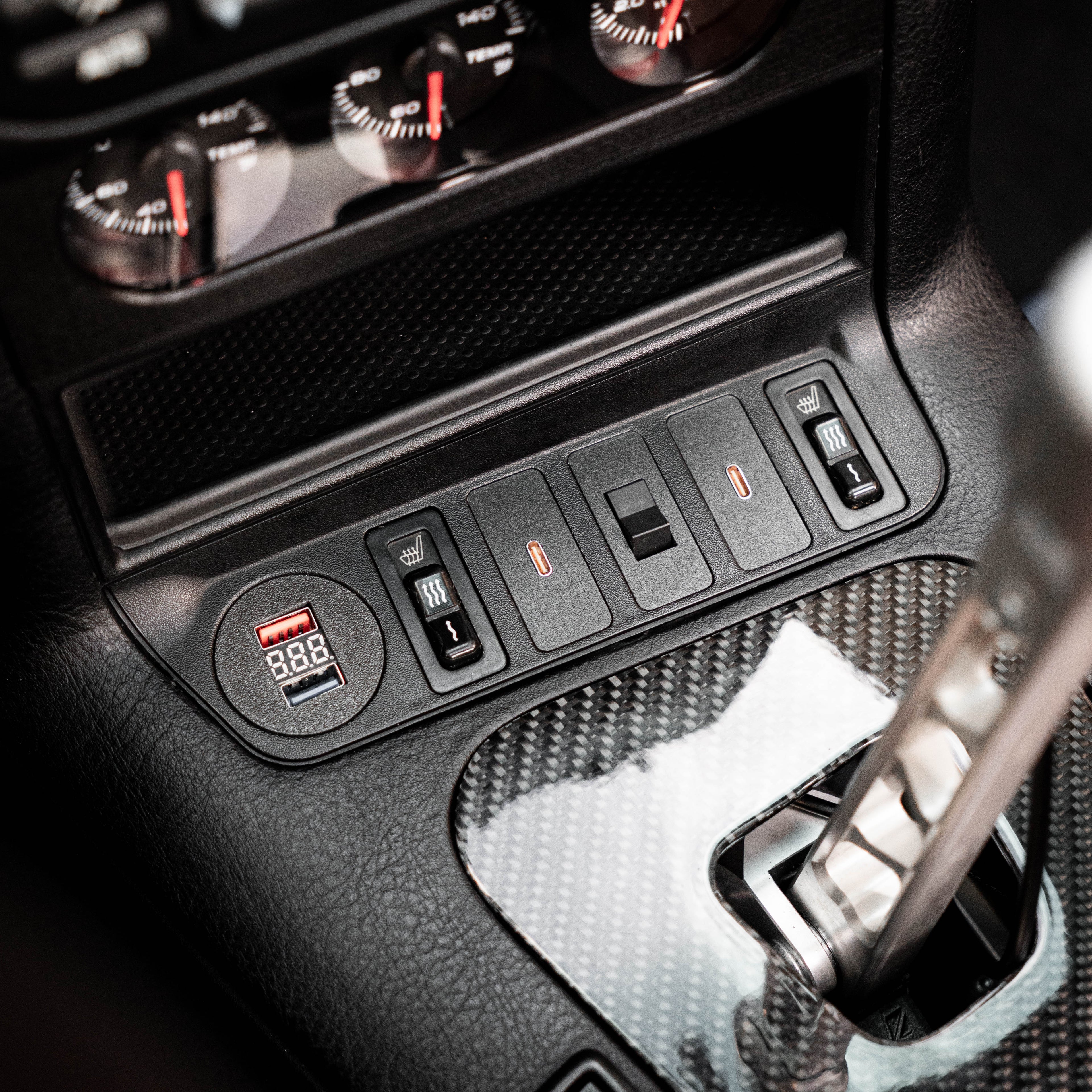 BMW E36 USB charging module installed in switch panel

