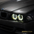 BMW E39 LED projector headlights with white halo rings and sharp beam pattern