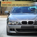 BMW E39 LED projector headlights with white halo rings and sharp beam pattern