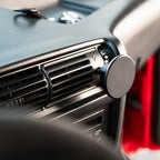 BMW E30 center vent phone mount with MagSafe holder installed