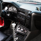 BMW E30 interior showing the phone mount position above the radio