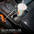 BMW E38 front cup holder in use, with the single USB-C charging option shown