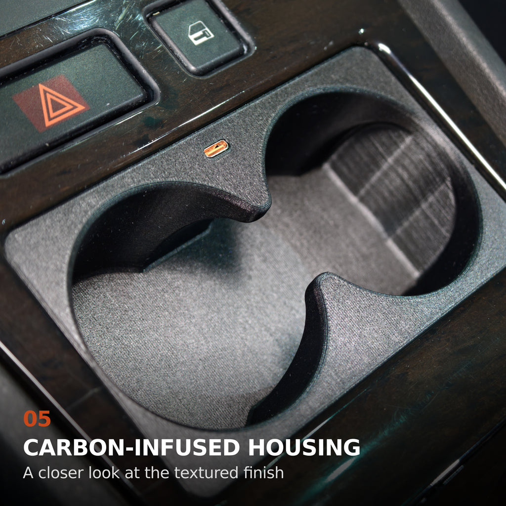 Close-up of the textured carbon-infused housing on the BMW E38 front cup holder, single USB-C version
