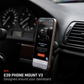 BMW E39 Phone Mount V3 with a phone installed beside the instrument cluster and center air vents.