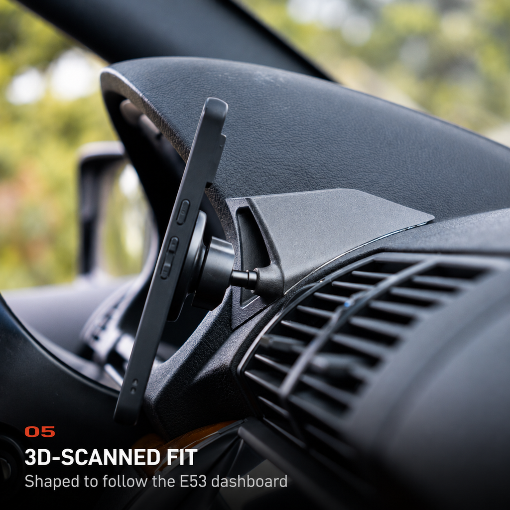 Side view of the BMW E53 X5 phone mount showing its 3D-scanned fit against the dashboard contour.