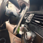 BMW E9x center phone mount holding a phone, side profile.