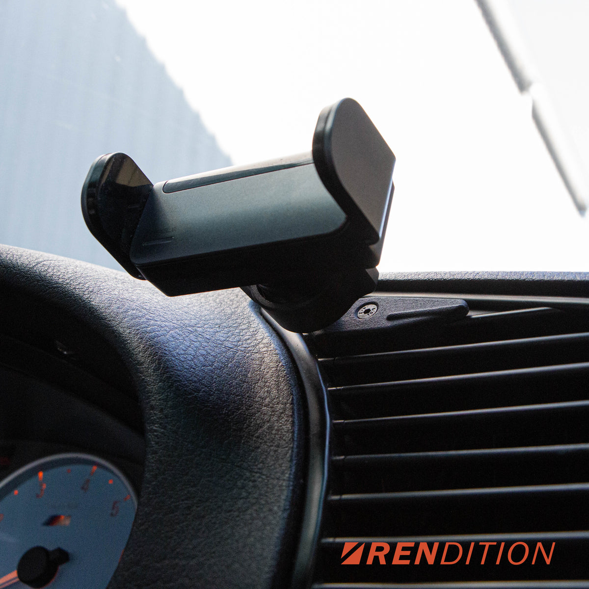 Universal 17mm ball joint mount on E36 bracket for phone holder attachment
